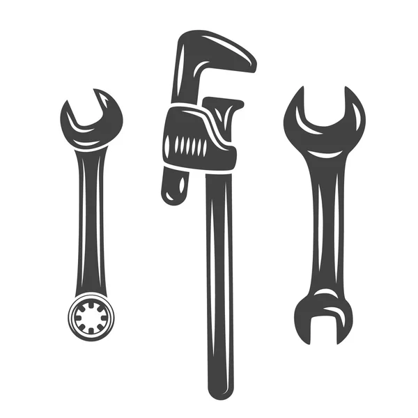 Um conjunto de três chaves, spanners. Preto na ilustração do vetor liso branco, elemento do logotipo isolado no fundo branco — Vetor de Stock