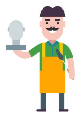 Heykeltıraş bir insan kafa heykelcik ile iş başında