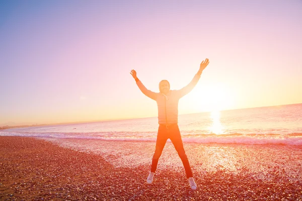 Man op het strand — Stockfoto