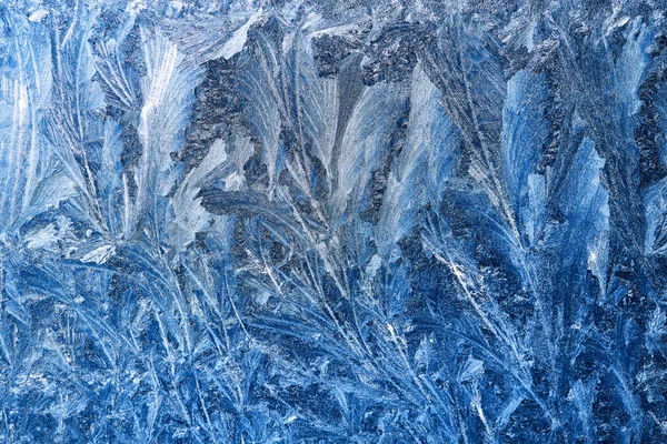 Patrones de hielo en vidrio de invierno — Foto de Stock