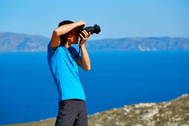 Deniz arka plan, Uçurumdaki fotoğrafçı
