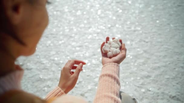 Woman holding salt cristal natural mineral formation — Stock Video