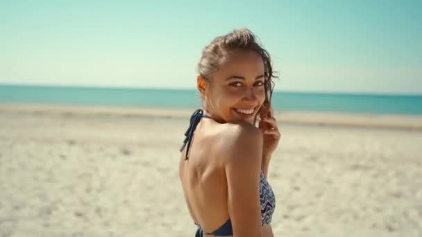 Portrait of beautiful young mixed race woman laughing cheerful enjoying lifestyle on calm sunny sandy beach feminine beauty — Stock Video