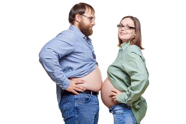 Young family waiting for baby on a white background — Stock Photo, Image