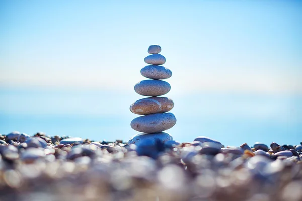 Stones balance on beach, sunrise shot Stock Image