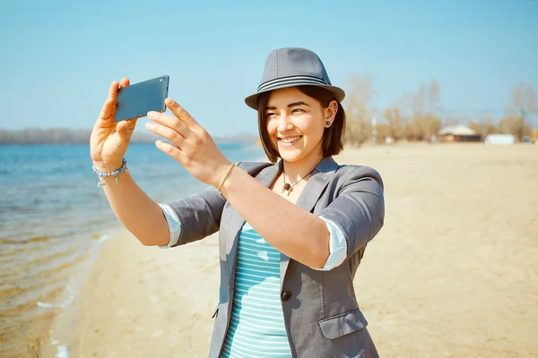 girl plays on the sea beach