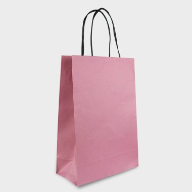 Çevre dostu pembe kağıt çanta izole edildi.