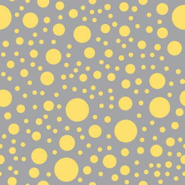 Gri arka planda yuvarlak sarı şekiller. Kusursuz, soyut, basit bir model. 2021 'in renkleri. Ambalaj kağıdı ve tekstil için uygun..