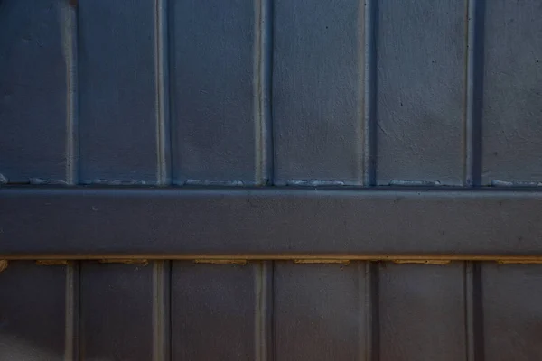 Rusty metal grilles, painted with paint and peeled off from old age, ventilation holes for air ingress in industrial facilities, an electric shield, an opening door — Stock Image Rusty Metal Grilles Painted Paint Peeled Old Age Ventilation Holes Royalty Free Stock Photos