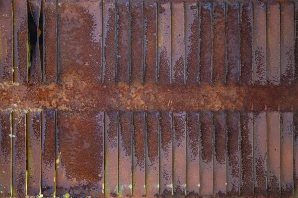 Rusty metal grilles, painted with paint and peeled off from old age, ventilation holes for air ingress in industrial facilities, an electric shield, an opening door — Stock Image Rusty Metal Grilles Painted Paint Peeled Old Age Ventilation Holes Stock Picture