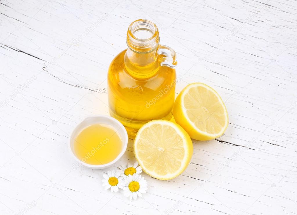 Spa Aromatic Oil and Lemon Slices on White