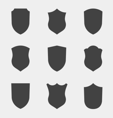 Düz Klip Tasarım Elementleri. Kalkan Silueti 'nin vektör seti. Farklı Arma İşaretleri