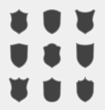 Düz Klip Tasarım Elementleri. Kalkan Silueti 'nin vektör seti. Farklı Arma İşaretleri