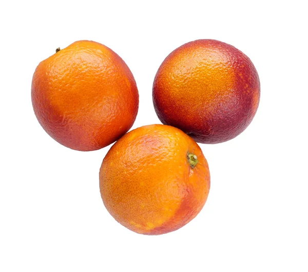 Tres coloridas naranjas sicilianas rojas aisladas en blanco — Foto de Stock