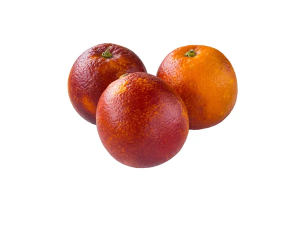 Três laranjas sicilianas vermelhas coloridas isoladas em branco — Fotografia de Stock