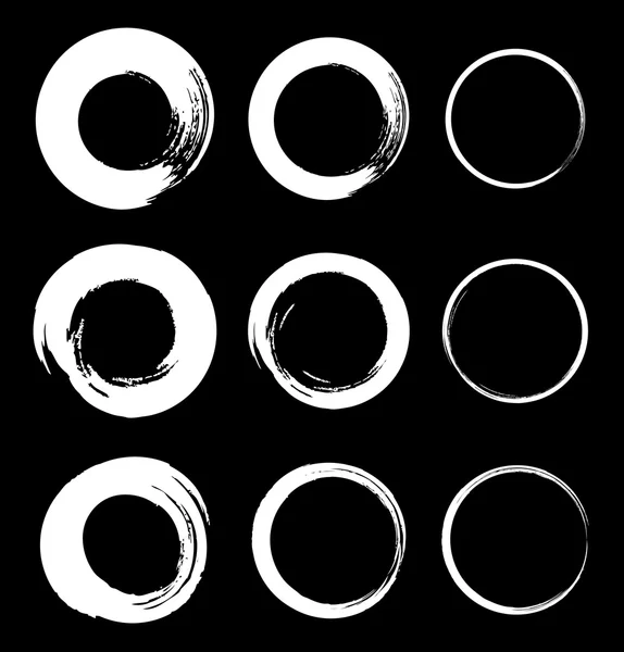 Uppsättning av vita Grunge cirkeln fläckar — Stock vektor
