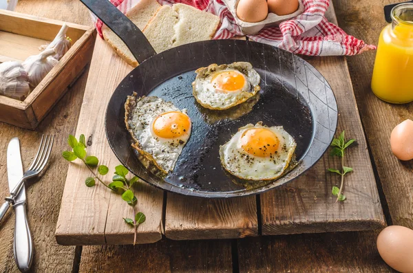 Eggs fried rustic style — Stock Photo, Image