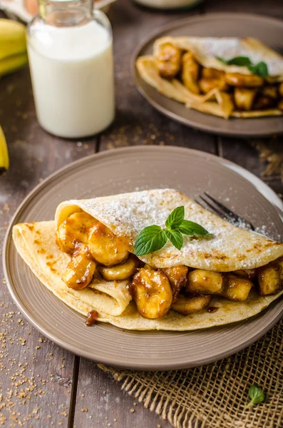 Pancakes stuffed with bananas — Stock Photo, Image