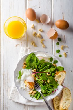 Lamb lettuce salad with fried egg clipart