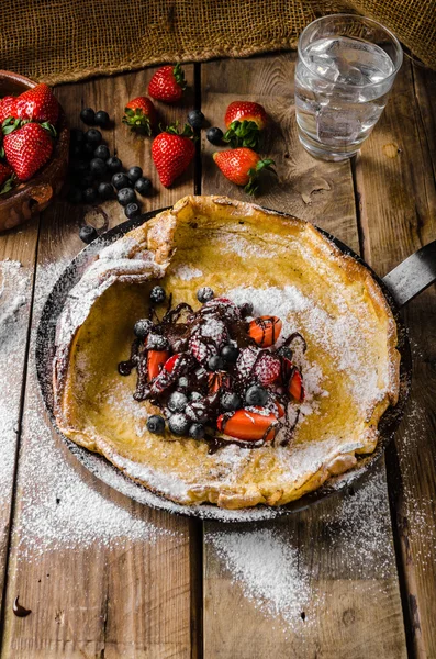 Dutch Baby Pancakes with berries and chocolate — Stock Photo, Image