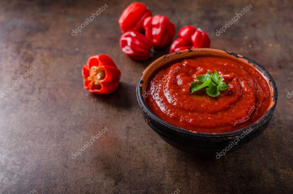 Hot sauce from chilli peppers Stock Photo by ©Peteer 111222406