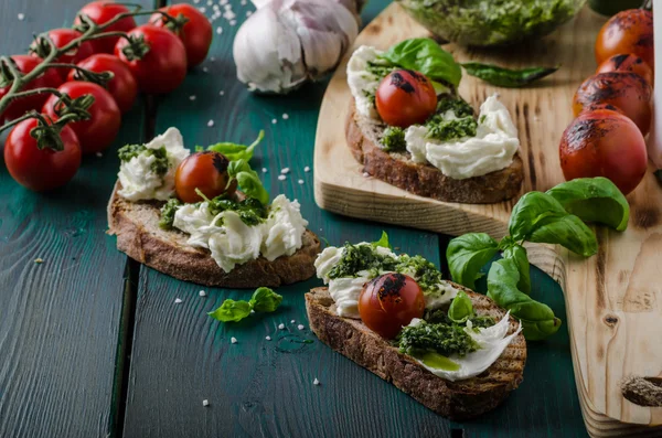 Grilled toasts with pesto — Stock Photo, Image