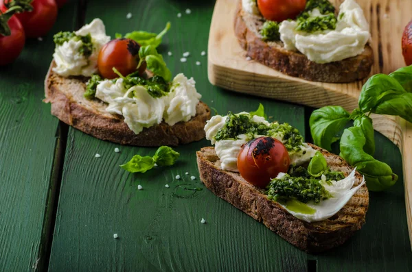 Grilled toasts with pesto — Stock Photo, Image