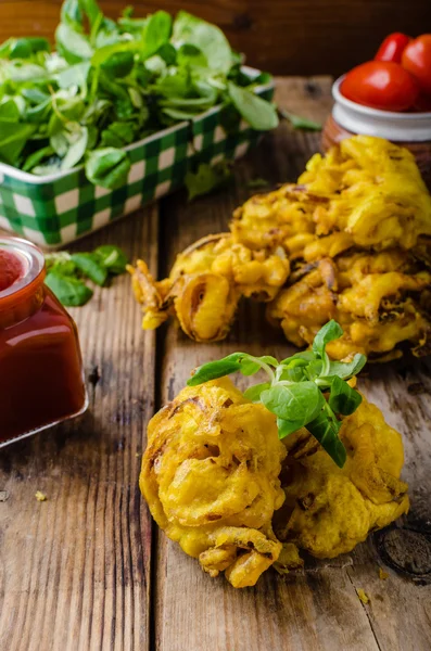 Sprø løk-bhaji. – stockfoto