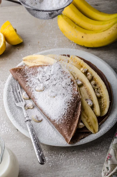 Crepes al cioccolato con banana — Foto Stock