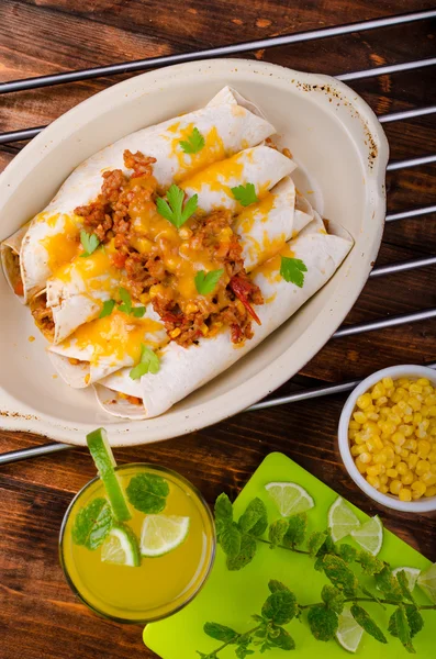 Baked meat tortilla with cheddar cheese — Stock Photo, Image