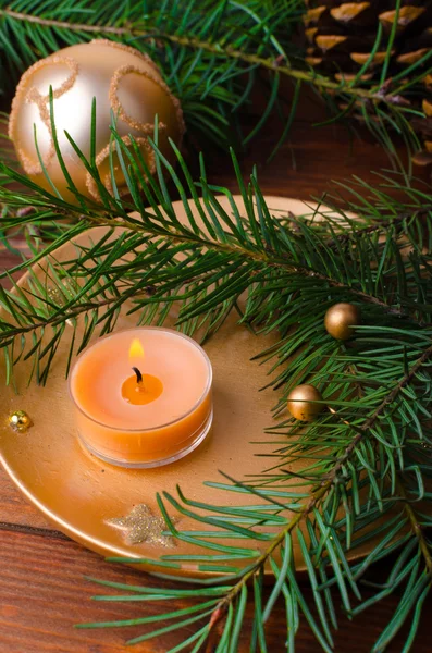 Christmas candle with pine needles — Stock Photo, Image