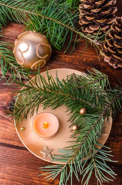 Christmas candle with pine needles — Stock Photo, Image