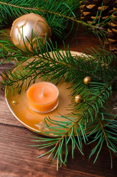 Christmas candle with pine needles — Stock Photo, Image