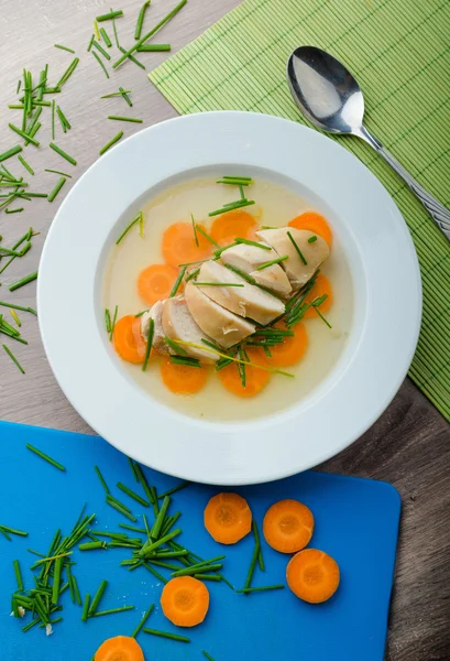 Chicken broth with fresh vegetables — Stock Photo, Image