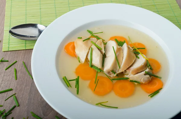 Chicken broth with fresh vegetables — Stock Photo, Image