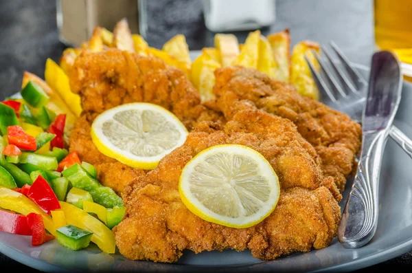 Schnitzel with french fries — Stock Photo, Image