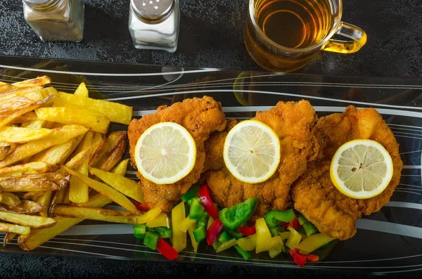 Schnitzel with french fries — Stock Photo, Image