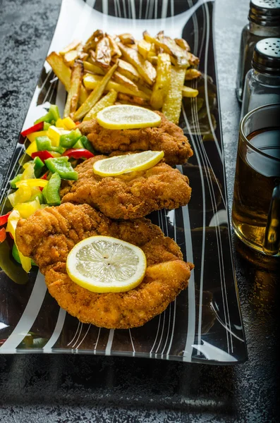 Schnitzel with french fries — Stock Photo, Image