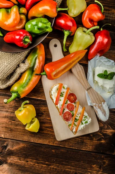 Healthy baguette, spread curd cheese with vegetable and herbs — Stock Photo, Image