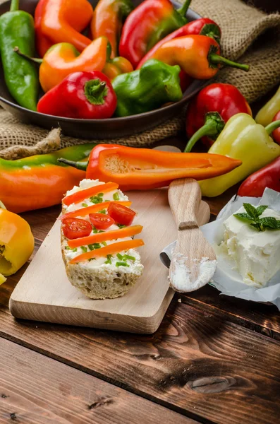 Healthy baguette, spread curd cheese with vegetable and herbs — Stock Photo, Image