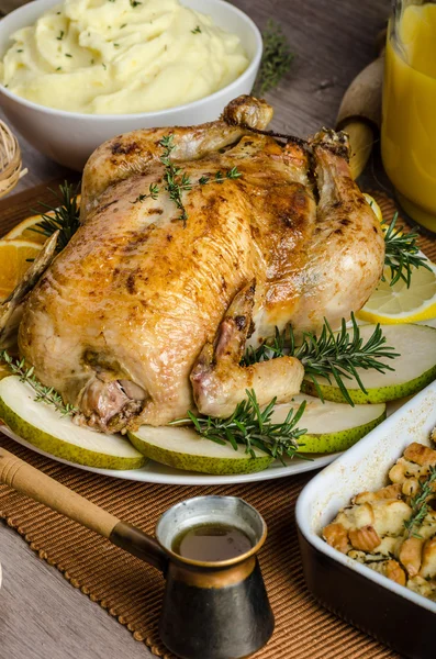 Feasting - stuffed roast chicken with herbs — Stock Photo, Image