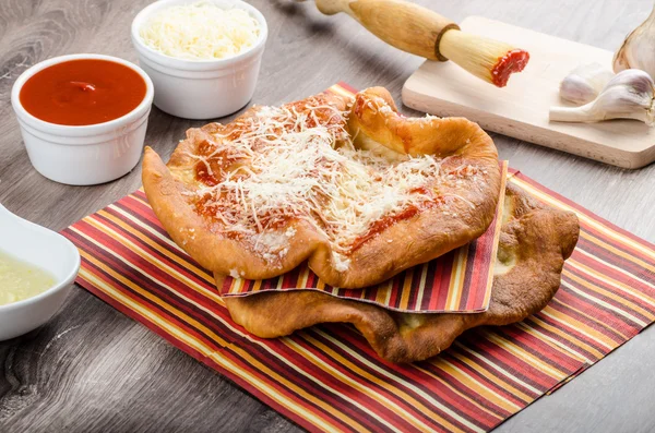 Deep fried langos — Stock Image Deep fried langos Royalty Free Stock Photos
