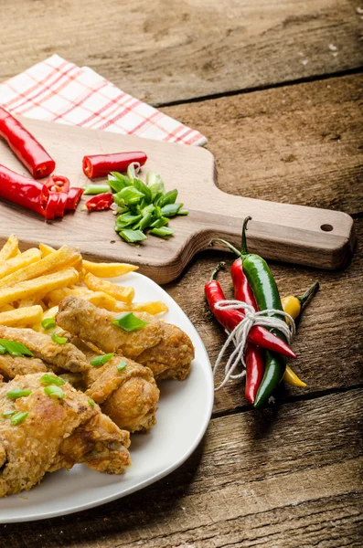 Fried chicken, chilli fries and dip — Stock Photo, Image