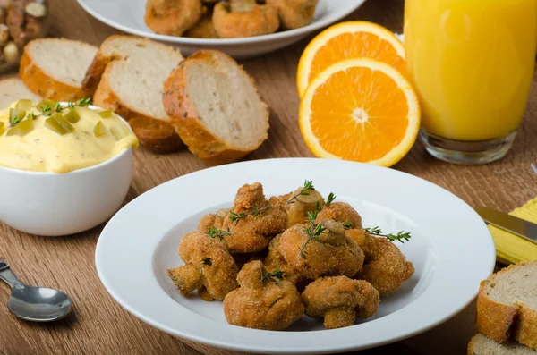 Breaded fried mushrooms with juice — Stock Image Breaded fried mushrooms with juice Stock Photo