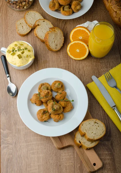 Breaded fried mushrooms with juice — Stock Image Breaded fried mushrooms with juice Stock Photo