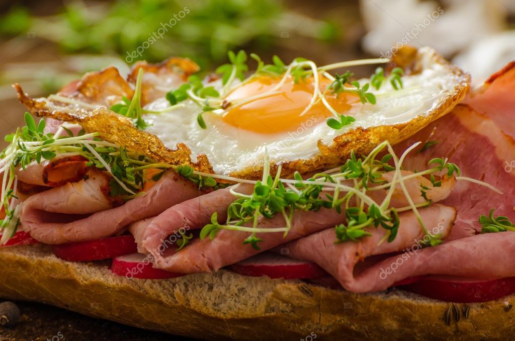 Smoked ham sandwich, rustic bread Stock Photo by ©Peteer 64393243