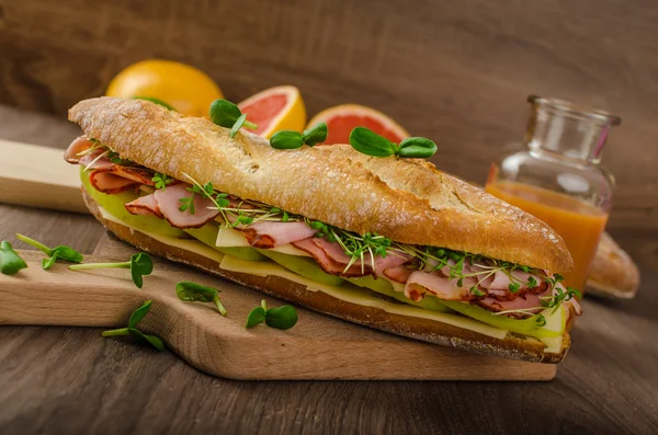 Rustic baguettes with smoked rump — Stock Photo, Image