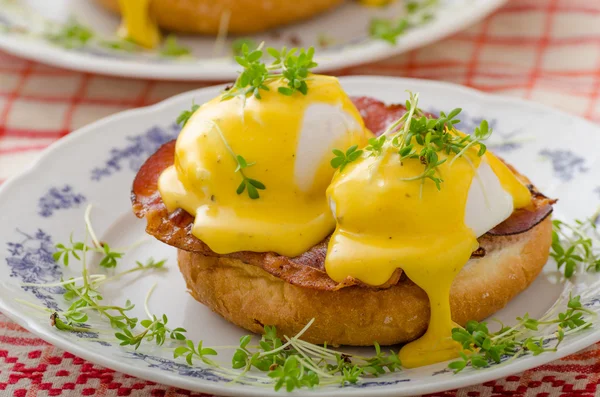 Eggs benedict, prosciutto with hollandaise