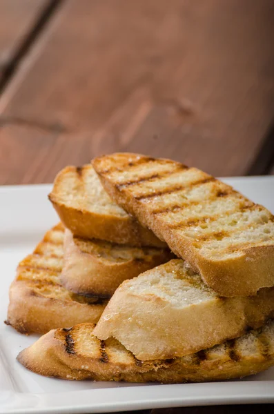 Garlic toast, mini baguettes, fresh and fragrant — Stock Photo, Image