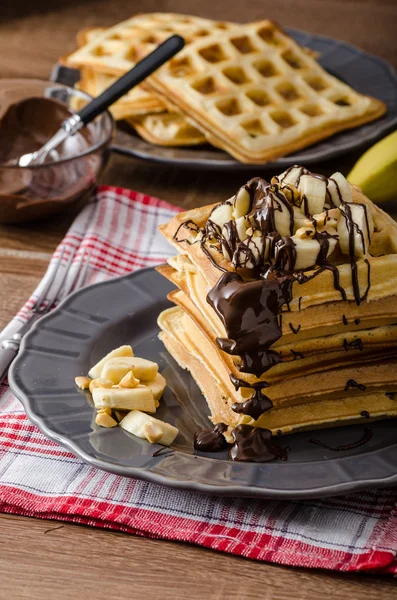 Waffles with bananas, nuts and chocolate — Stock Photo, Image